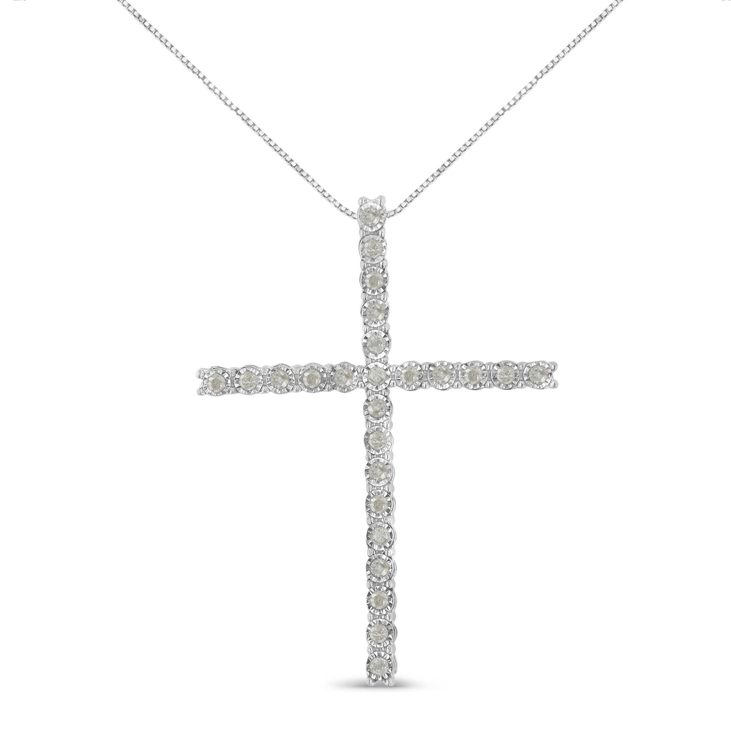 Front-facing view of a white metal cross-shaped necklace pendant adorned with round white gemstones in a miracle setting.