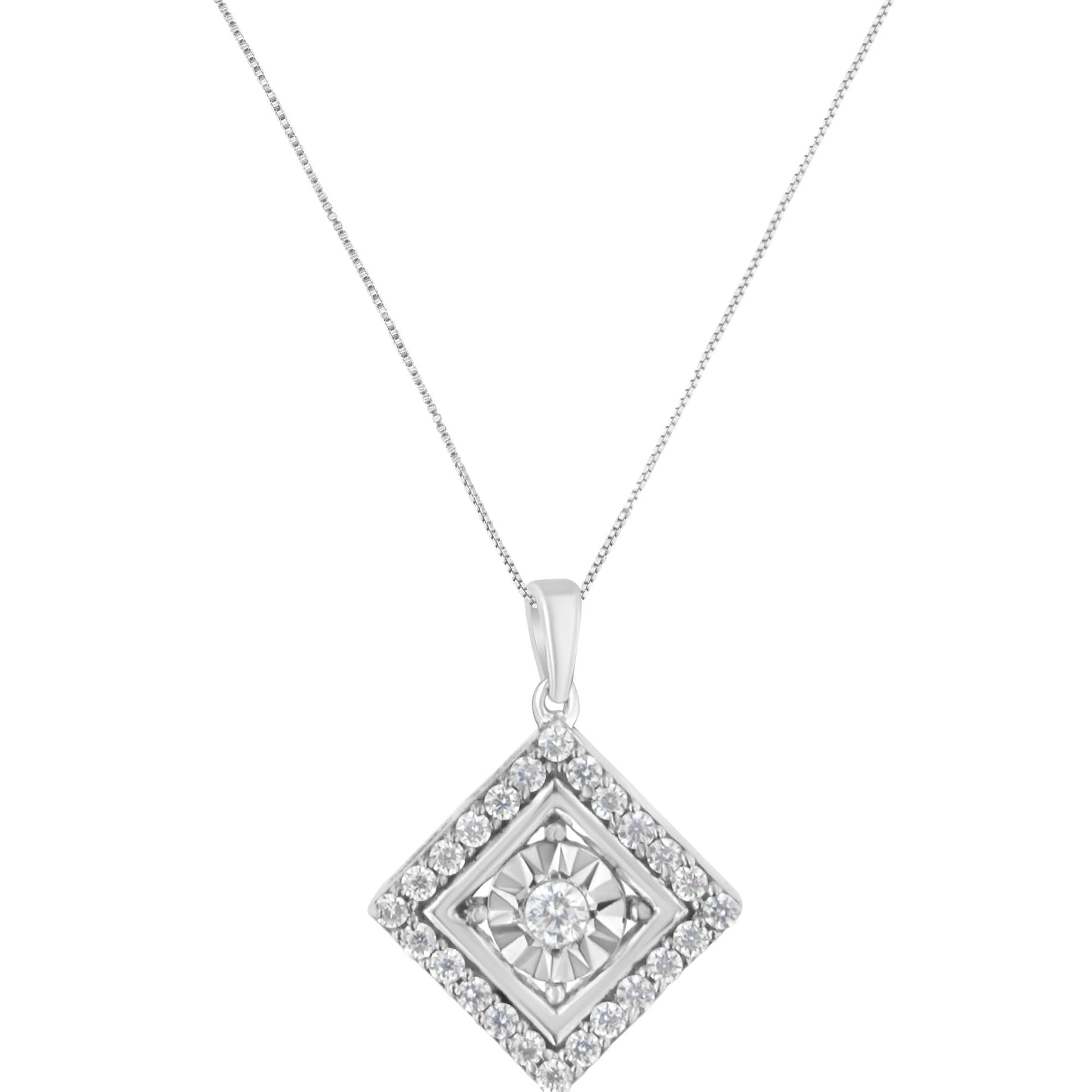 Front angle of white metal necklace with square-shaped pendant featuring a central round gemstone in miracle setting surrounded by rows of round gemstones in prong settings.