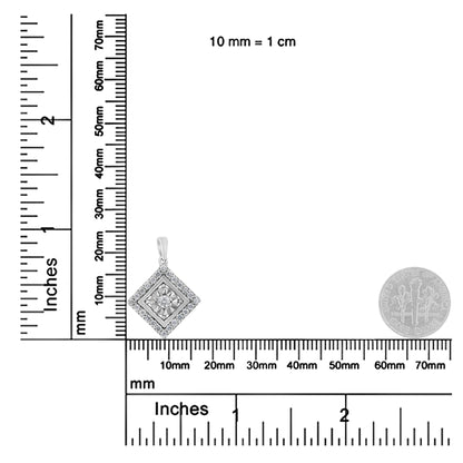 White metal square-shaped necklace pendant with a single center round white gemstone in miracle setting surrounded by multiple round white gemstones in prong settings, shown on a ruler and dime for size reference, photographed from the front.