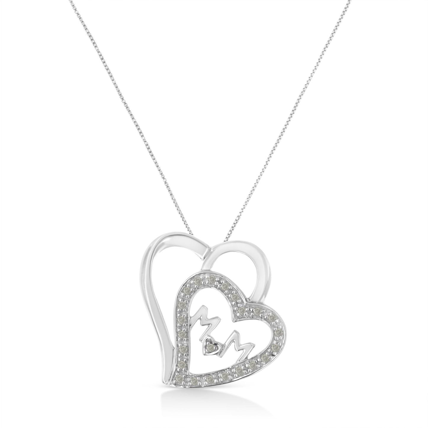 Front view of a white metal heart-shaped necklace pendant with another heart outline set with round white gemstones and the letters 'M' and 'M' inside, hanging from a chain.