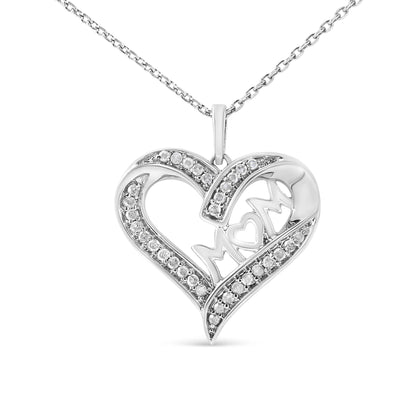 Front view of a white metal heart-shaped necklace pendant with pavé-set round white gemstones and an openwork 'MOM' inscription in the center, hanging from a matching chain.