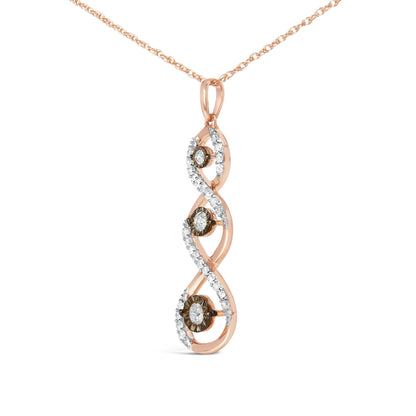 Pendant necklace with two-toned metal twisted design, featuring three round champagne-colored gemstones in miracle settings surrounded by multiple round white gemstones in prong settings, shown in a front-facing angle.