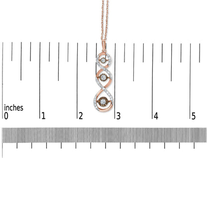 Front view of a two-toned necklace pendant with a twisted design featuring white gemstone accents and three champagne-colored gemstones in a miracle setting, shown on a ruler for size reference.