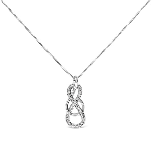 Front view of a white metal necklace with an abstract infinity-shaped pendant adorned with white round gemstones in prong settings.