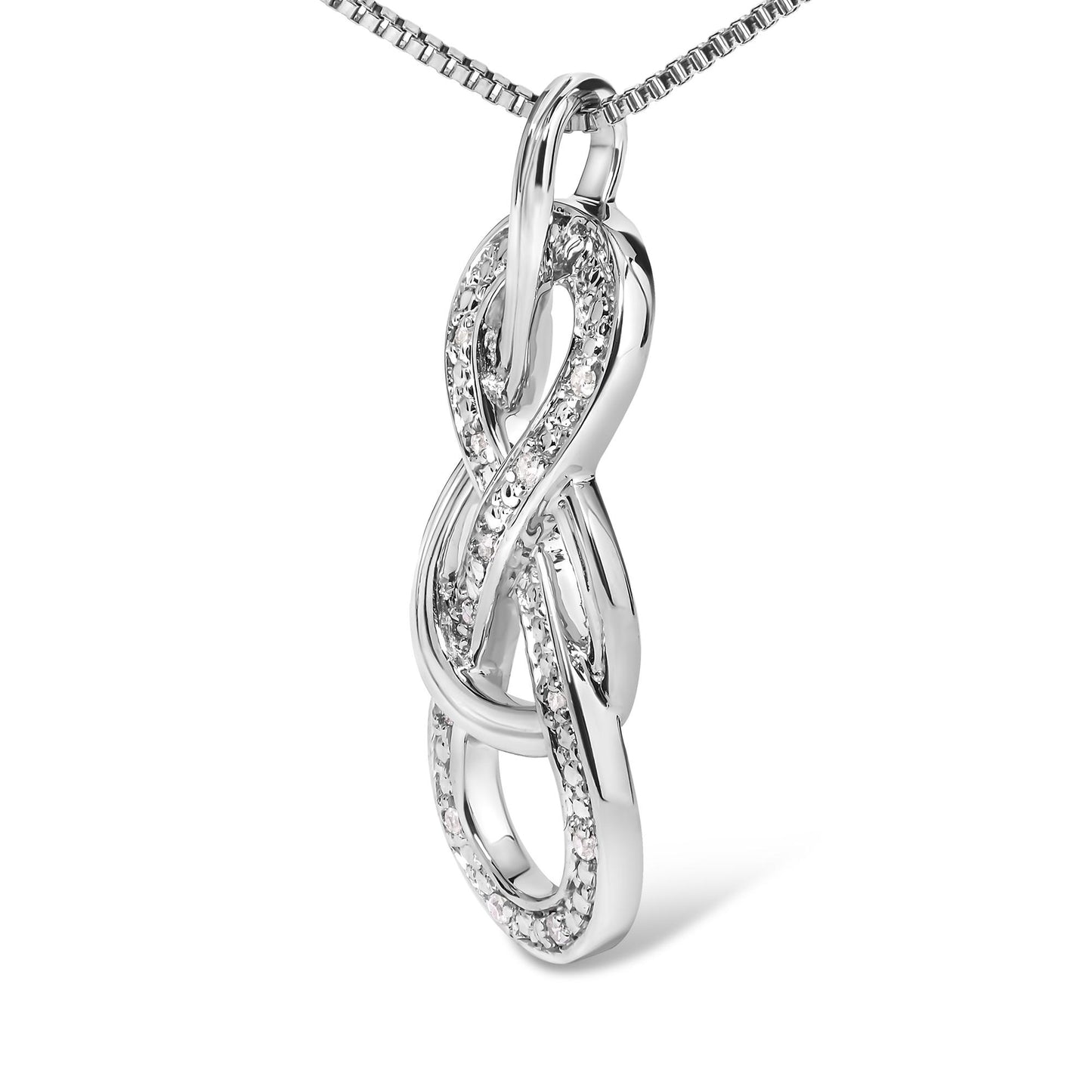 Close-up front angle of a white metal necklace pendant featuring an intertwined loop design with round white gemstones in prong settings along the curves.