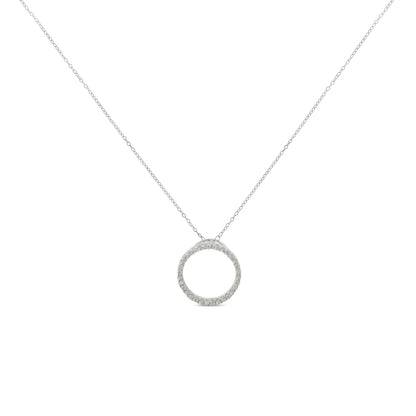 Front view of a white metal necklace with a circular pendant featuring round white gemstones in a pave setting.