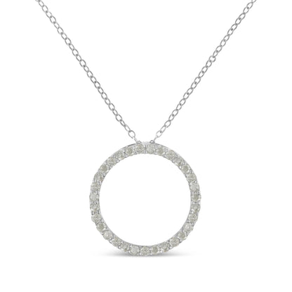 Front view of a white metal necklace with a circular pendant encrusted with round white gemstones in a pave setting.