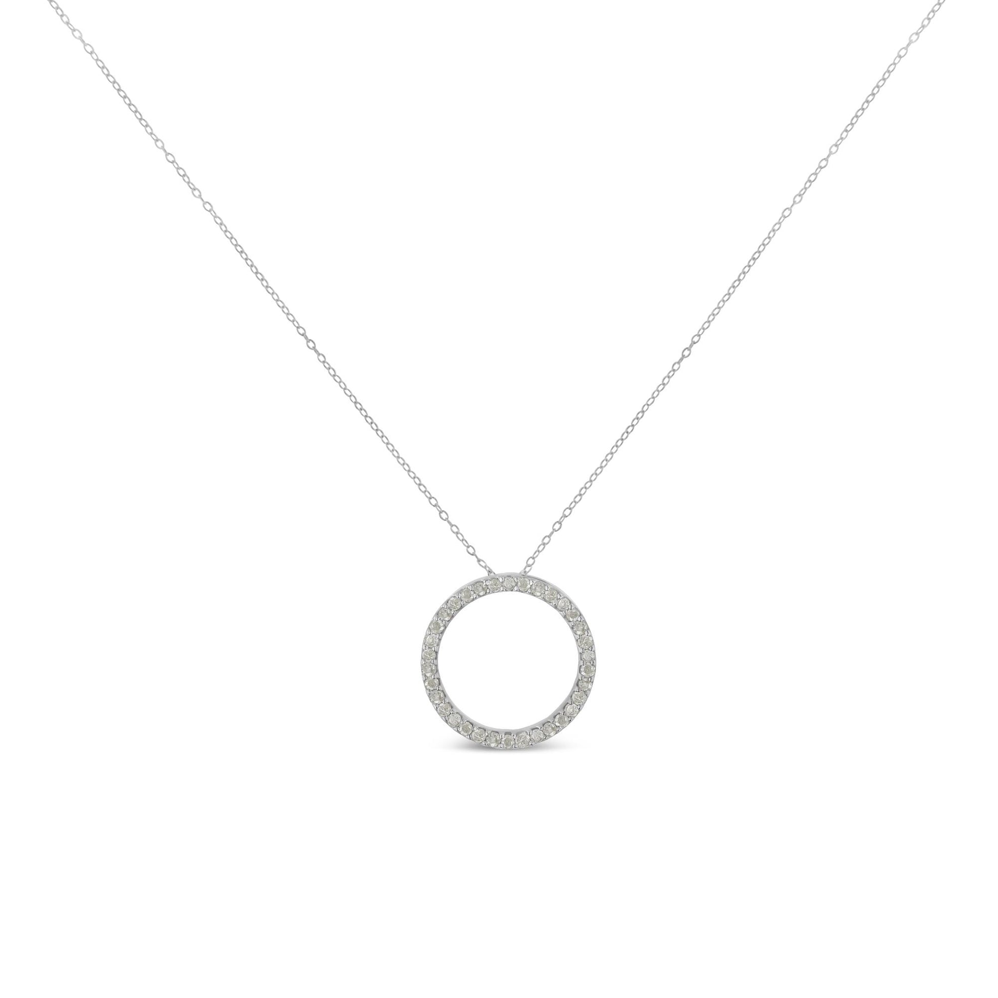 Front view of white metal circular necklace pendant with round white gemstones in pave setting on a delicate chain.