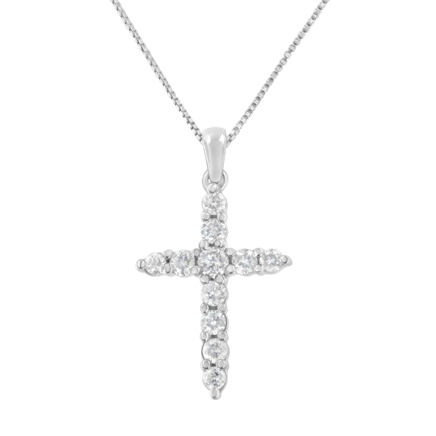 Front view of a white metal cross pendant necklace with round prong-set white gemstones on a chain.