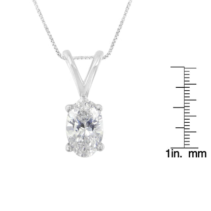 Front view of a white necklace with an oval-shaped white gemstone set in prongs, shown with a size ruler on the right.
