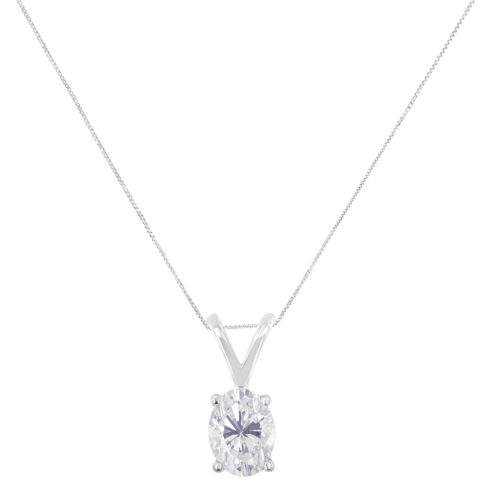 Front view of a white metal necklace with an oval-shaped white gemstone in a prong setting pendant.