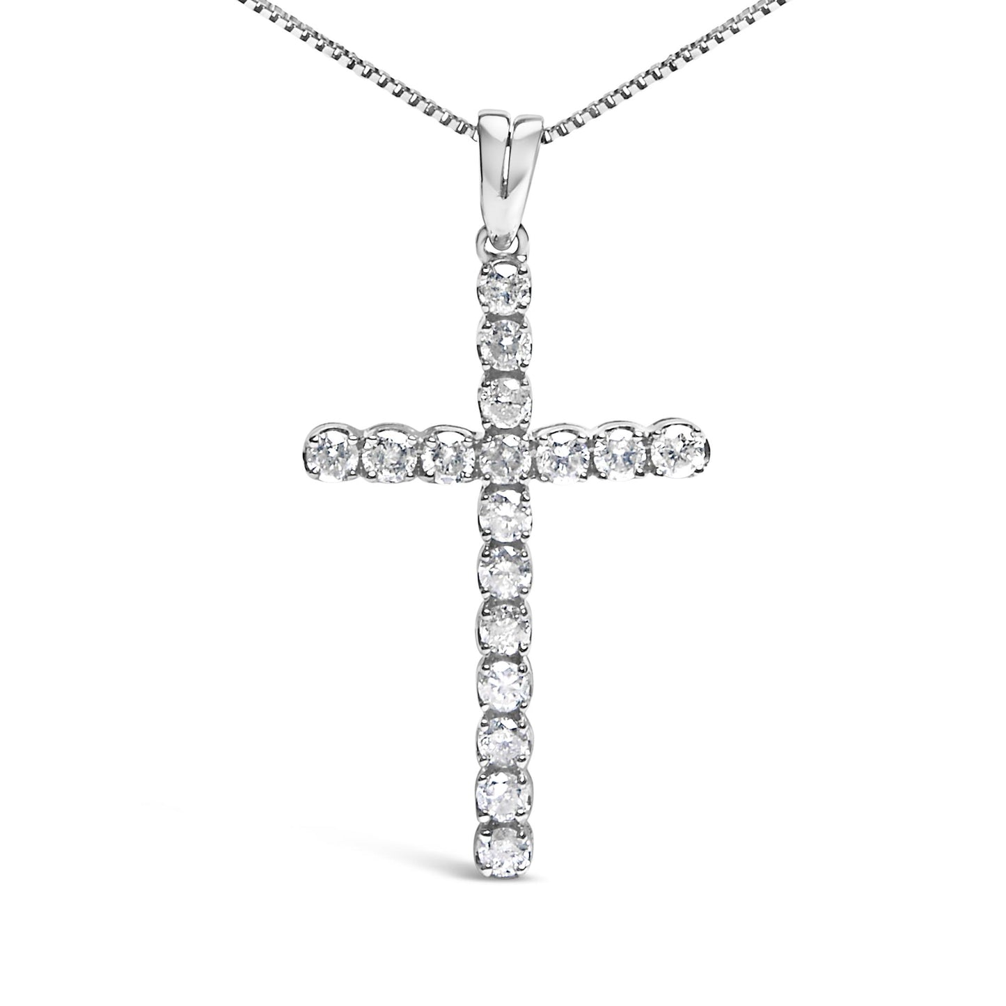 Front-facing shot of a white metal cross necklace pendant with round white gemstones in prong settings.