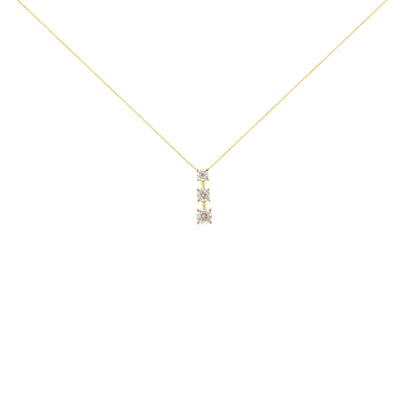 Front view of a necklace with a yellow chain and a vertical pendant featuring three round white gemstones in miracle settings with white metal prongs.