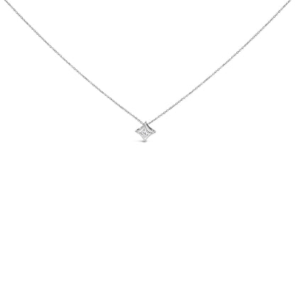 Front-facing view of a white necklace with a single princess-shaped white gemstone in bezel setting pendant.