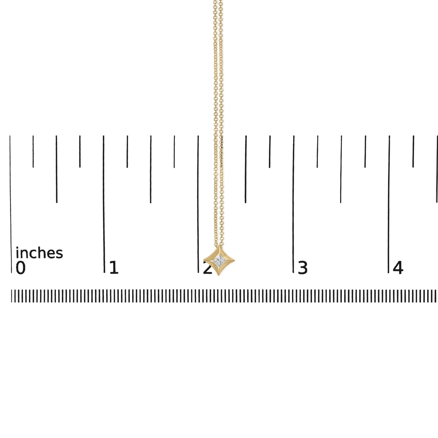 Yellow metal necklace with a small princess shape white gemstone in bezel setting pendant, shown hanging vertically on a scale, front view.