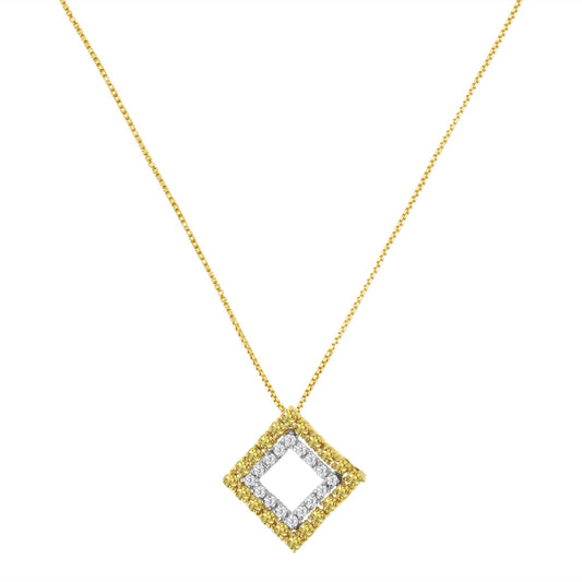 Front view of a necklace with a diamond-shaped pendant featuring two rows of round prong-set gemstones; outer row is yellow and inner row is white, on a yellow metal chain.