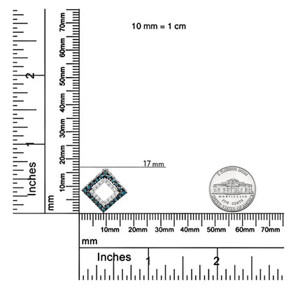 White metal necklace pendant shaped as a diamond with round prong-set blue and white gemstones, shown on a ruler and scale for size reference, photographed from the front angle.