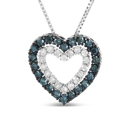 Front-facing view of a white metal heart-shaped pendant necklace featuring two rows of round prong-set gemstones, with an outer row of blue gemstones and an inner row of white gemstones.