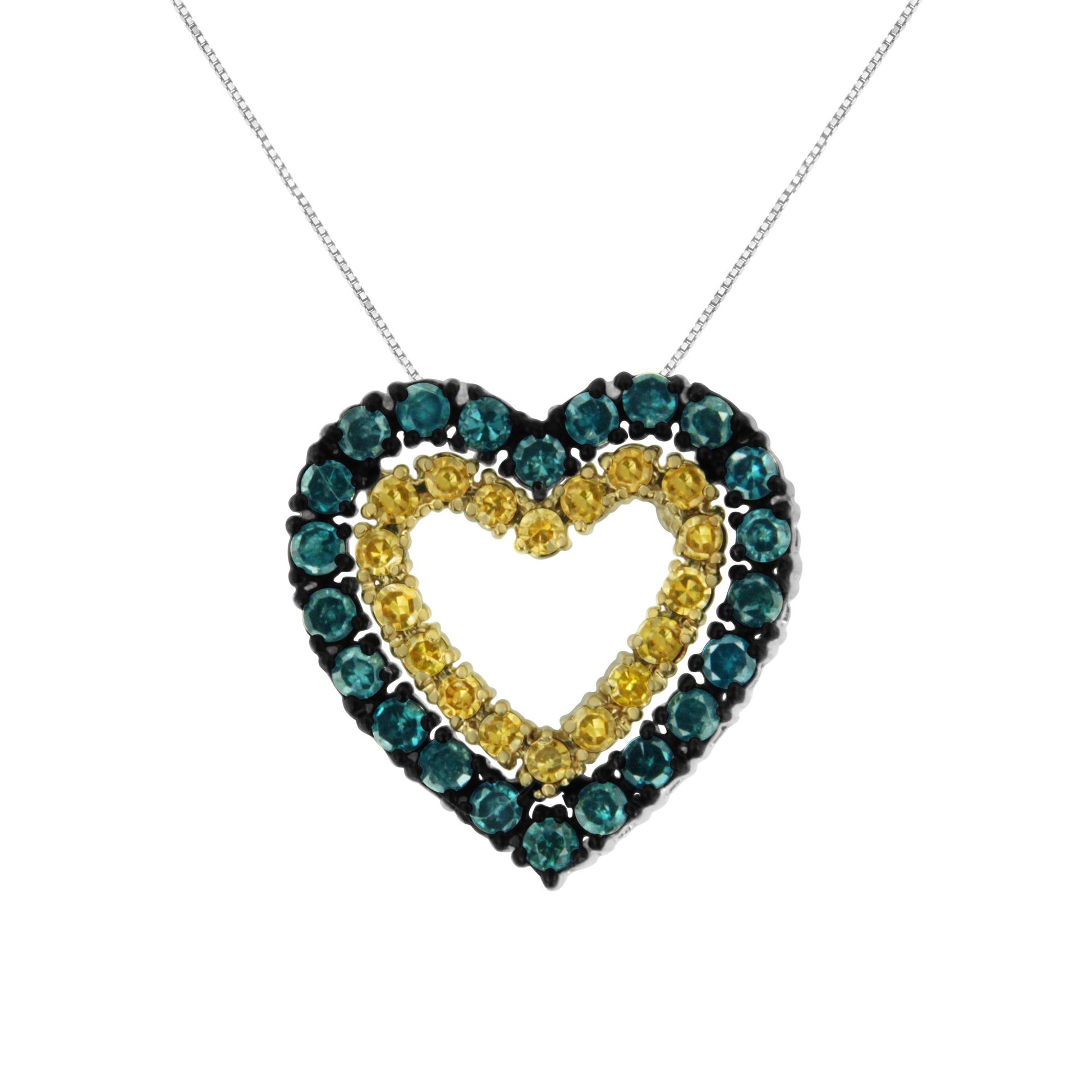 Front-facing close-up of a yellow metal heart-shaped necklace pendant with round blue and yellow gemstones in prong settings.