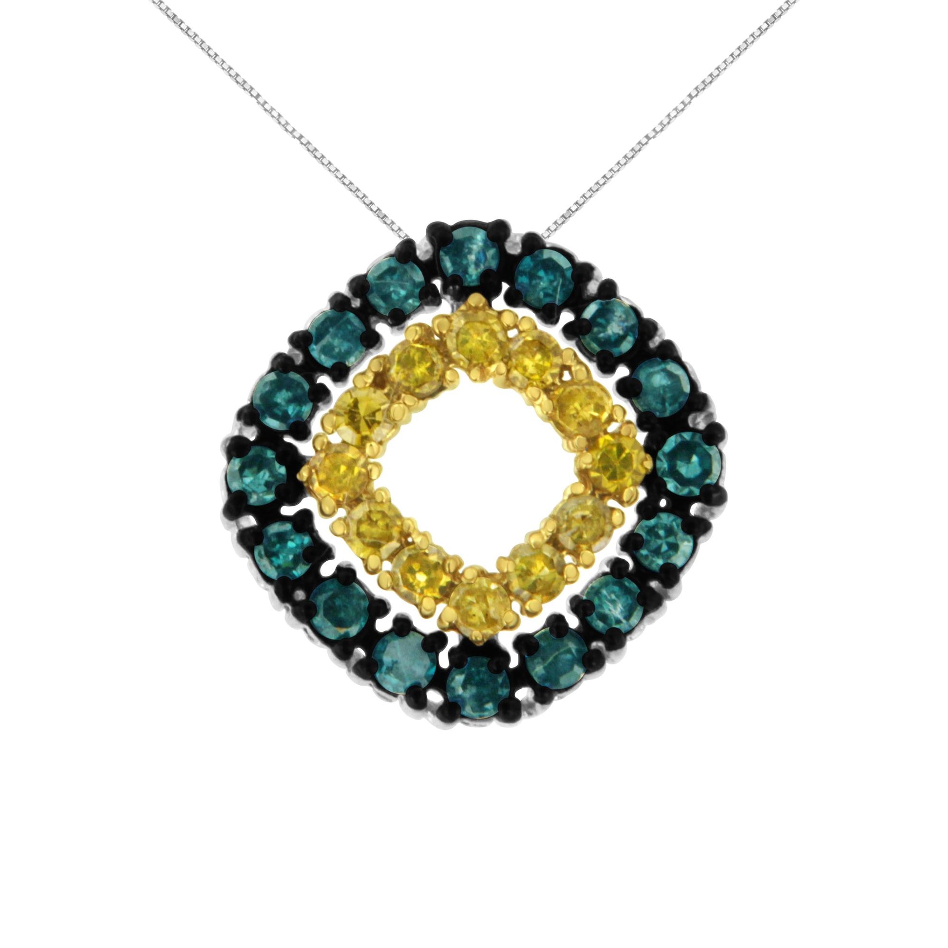 Front-facing close-up of a white metal necklace with a circular pendant featuring two rows of round prong-set gemstones, an outer row of blue gemstones and an inner row of yellow gemstones.