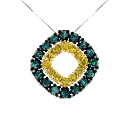 Front-facing close-up of a white metal necklace with a circular pendant featuring two rows of round prong-set gemstones, an outer row of blue gemstones and an inner row of yellow gemstones.