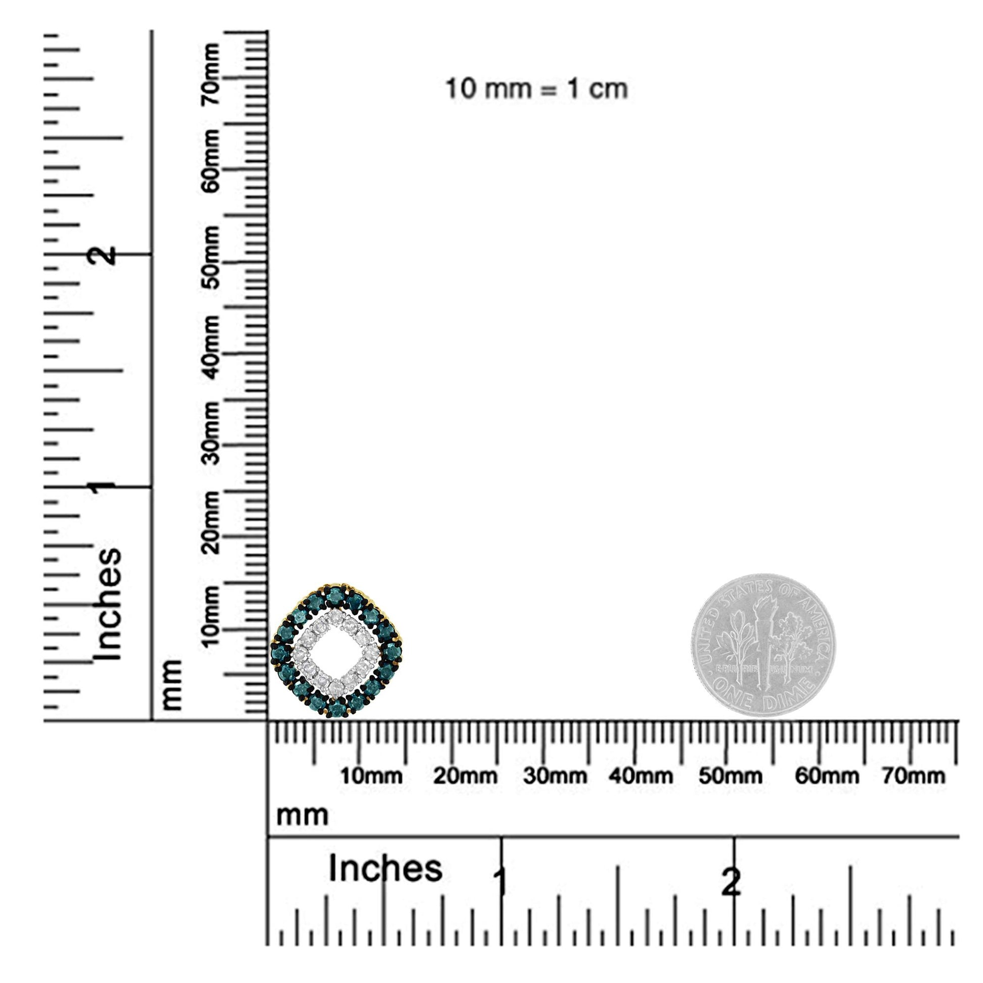 Yellow metal necklace pendant with round prong-set blue and yellow gemstones in a square-shaped design, shown on a ruler and scale for size reference, front angle.