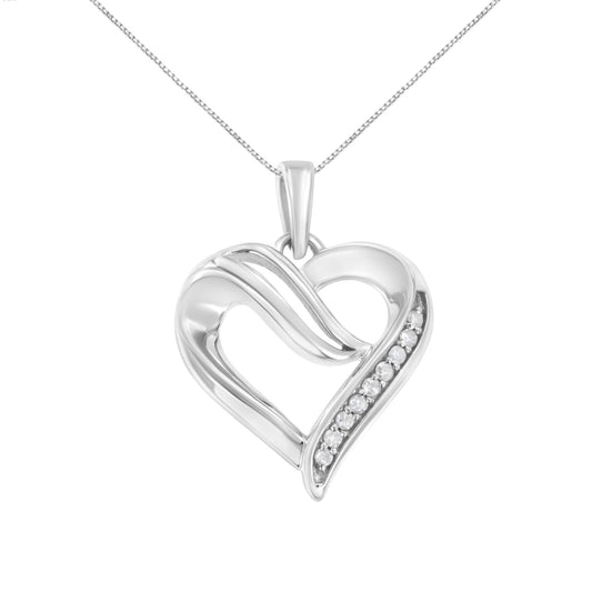White metal heart-shaped necklace pendant with flowing lines and a row of round white gemstones set on one side, shown from the front angle.