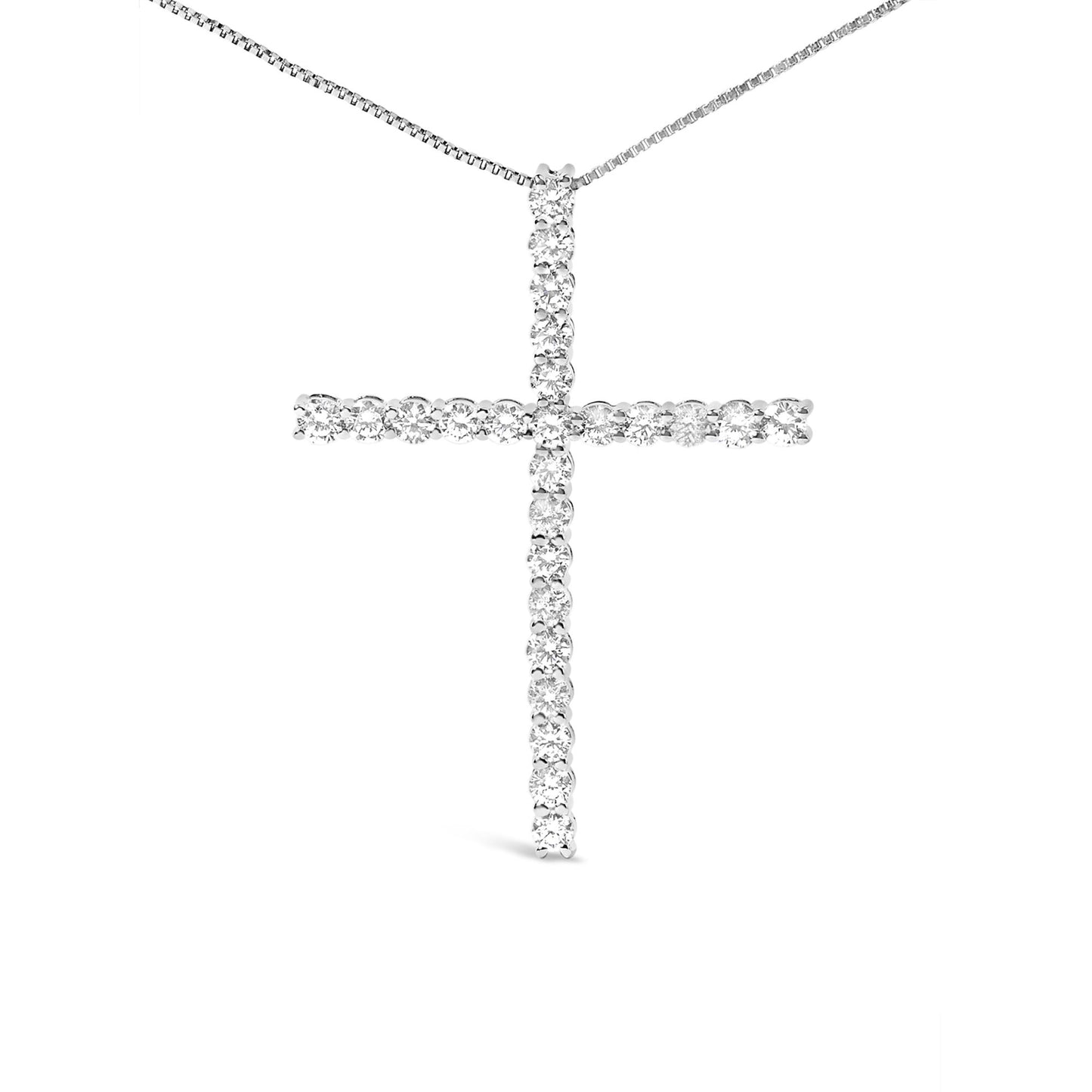 Front-facing view of a white metal cross-shaped necklace pendant with round white gemstones in prong settings on a thin white metal chain.