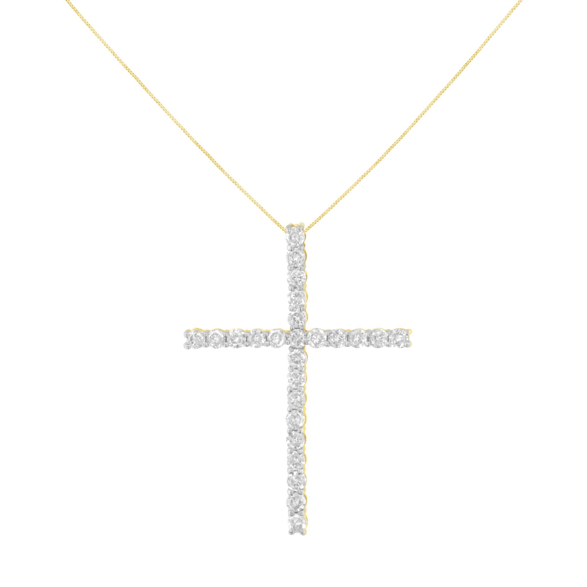 Front view of a yellow metal necklace with a cross pendant adorned with round white gemstones in prong settings.