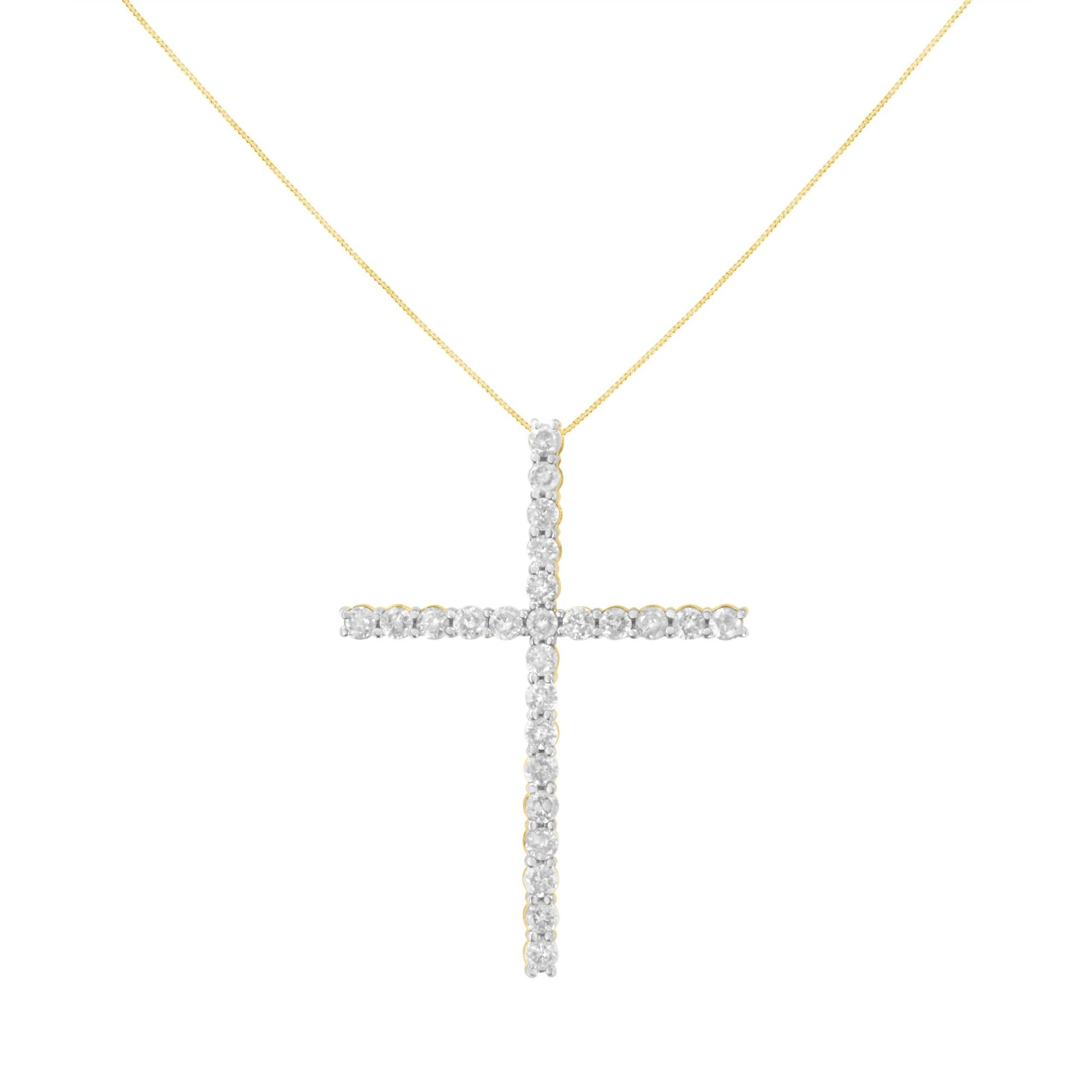 Front view of a yellow metal necklace with a cross-shaped pendant featuring round white gemstones in prong settings.