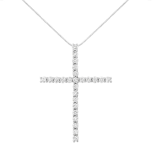 Front view of a white metal cross necklace pendant with round white gemstones in prong settings, hanging from a chain.