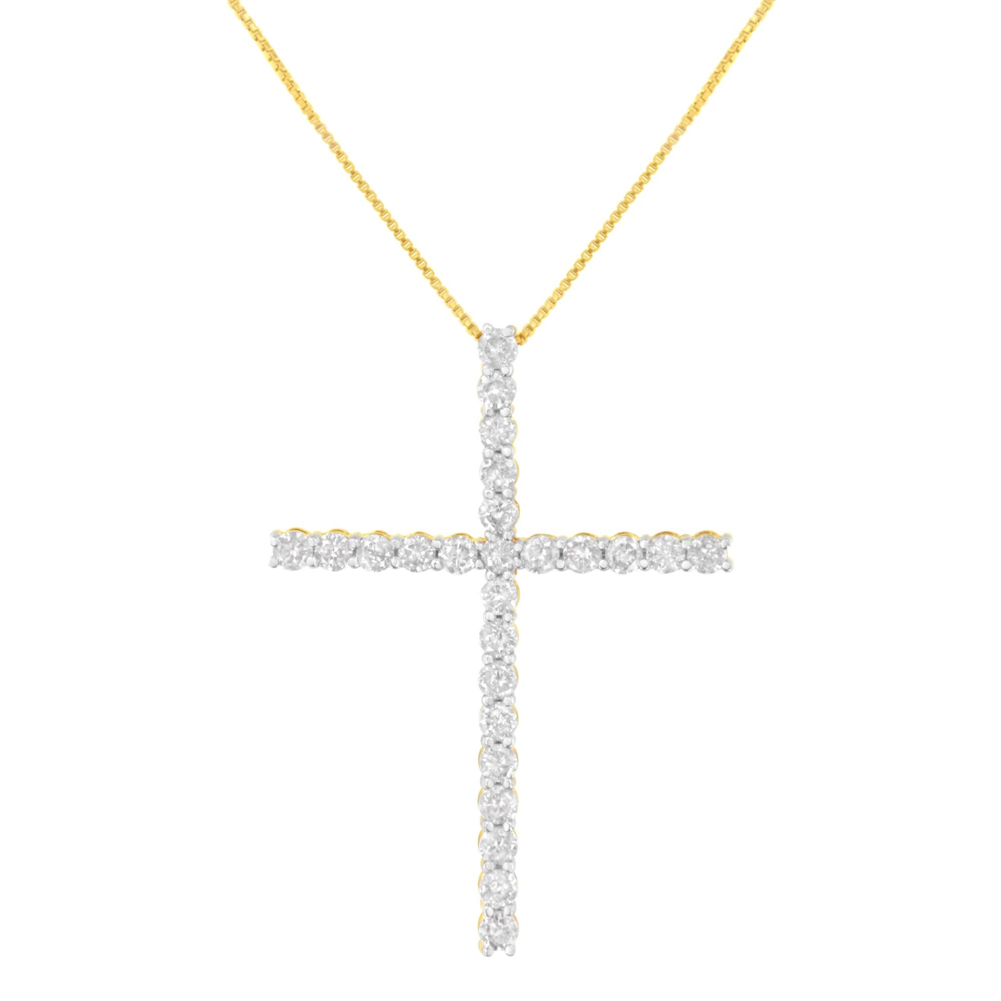 Front view of a yellow metal necklace featuring a cross pendant adorned with round white gemstones in prong settings.
