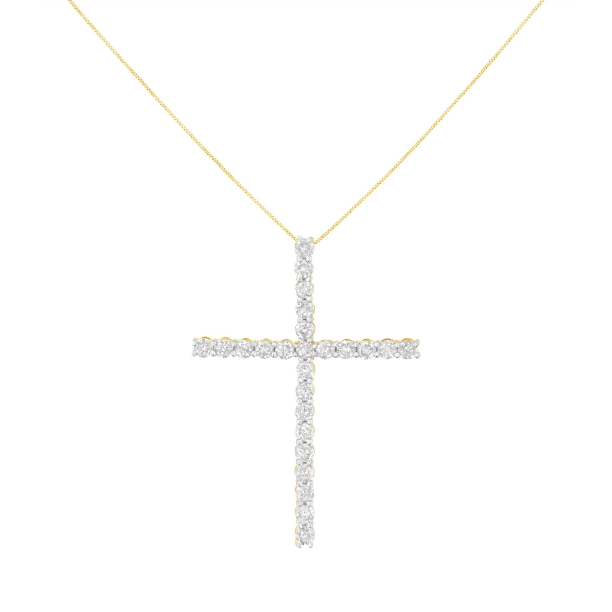 Front view of a yellow metal necklace with a cross-shaped pendant featuring multiple round-shaped, white gemstones in prong settings.