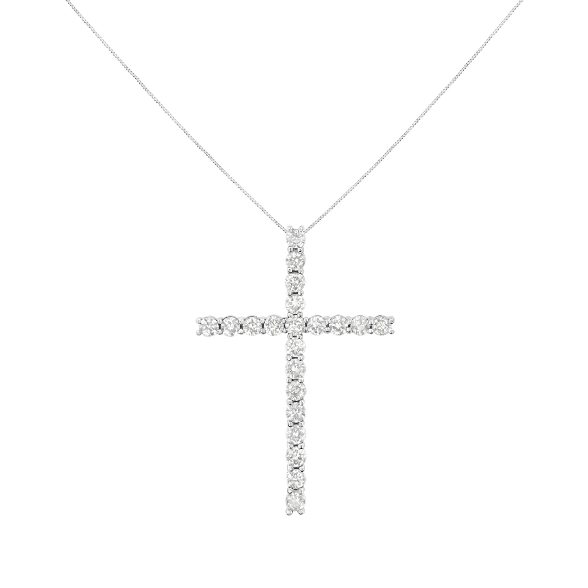 White metal necklace with a cross-shaped pendant set with round white gemstones, shown front-on.