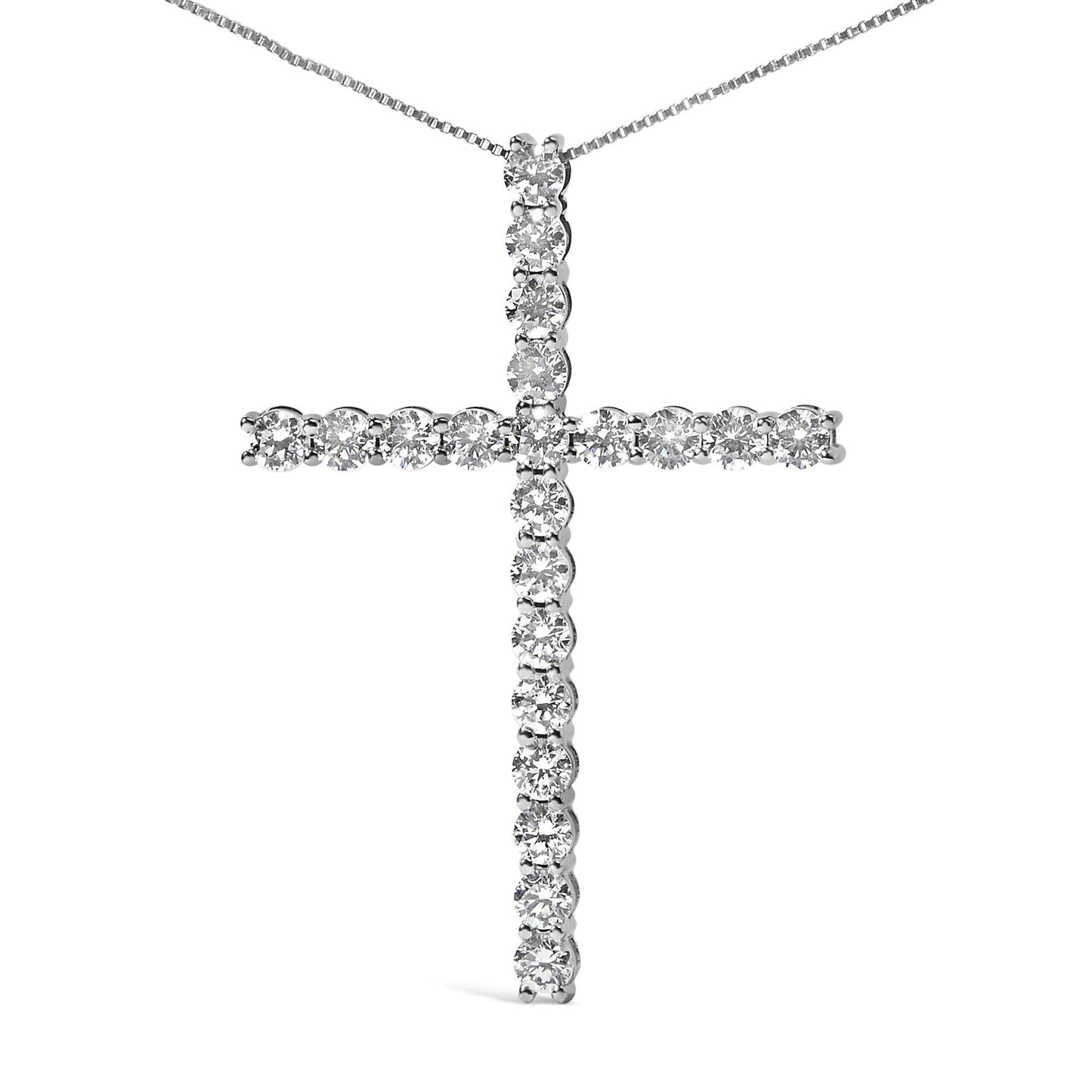 Close-up front view of a white necklace featuring a cross pendant adorned with round white gemstones in prong settings.