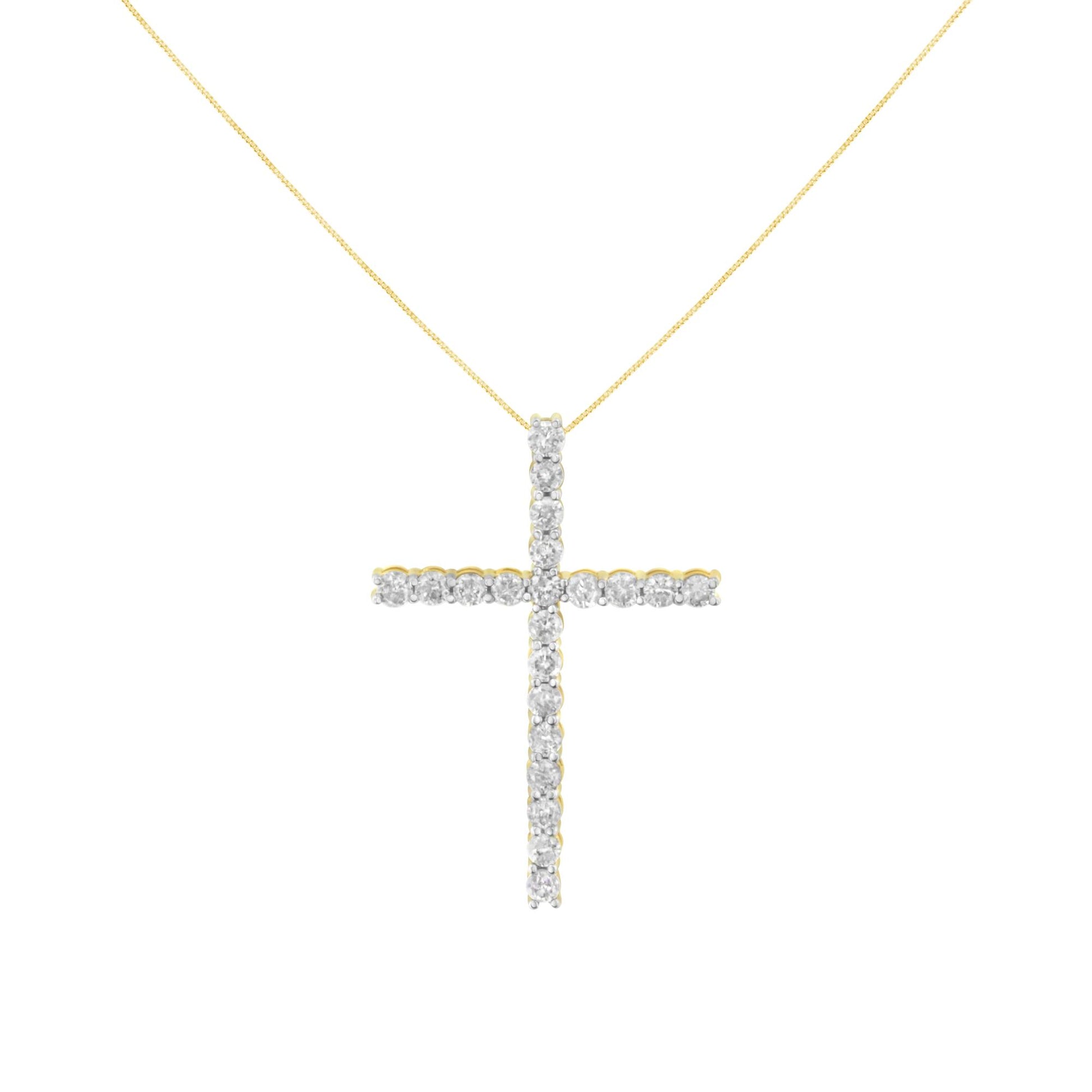 Front view of a yellow necklace with a cross-shaped pendant featuring round white gemstones in prong settings.