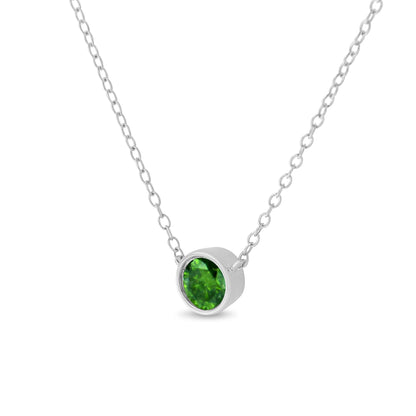 White metal necklace with a round green gemstone in a bezel setting, shown in a front angled close-up.
