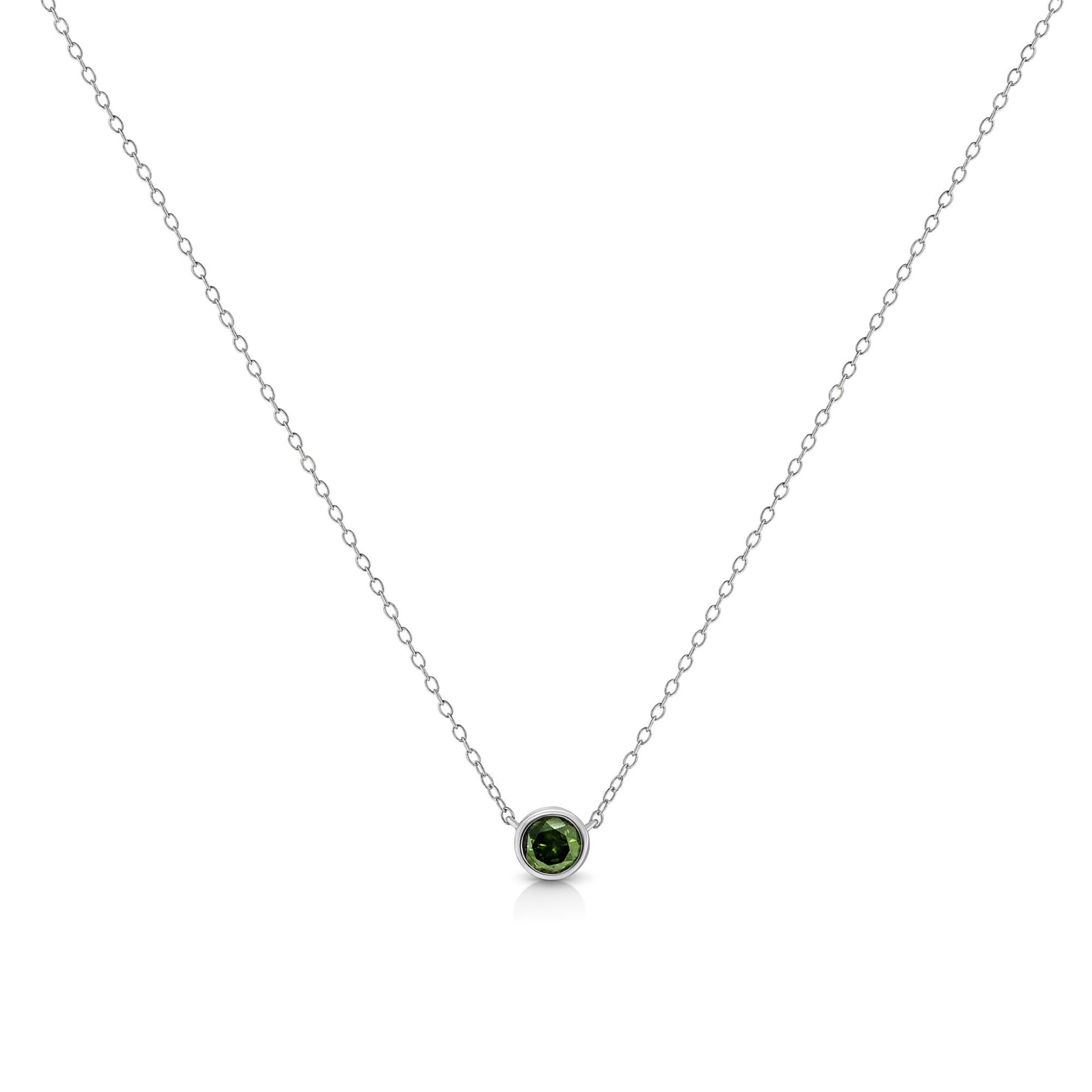Front view of a white metal necklace with a single round green gemstone in a bezel setting at the center.