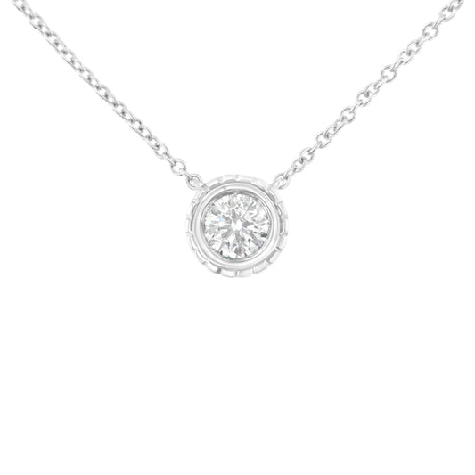 Front view of a white necklace with a round white gemstone in a bezel setting pendant.