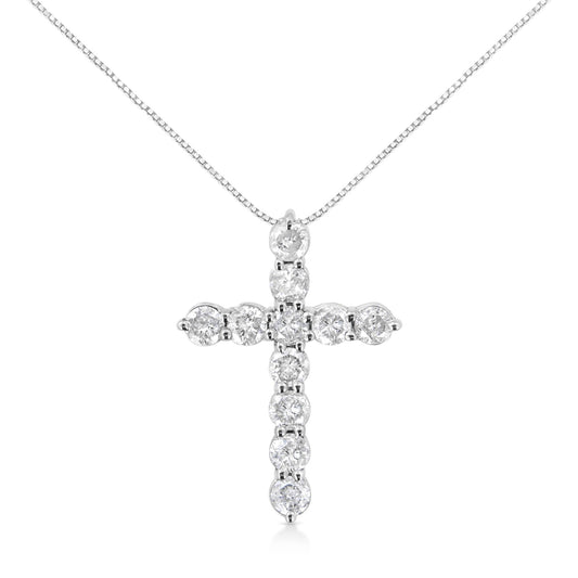 White metal necklace with a cross pendant featuring round white gemstones in prong settings, front view.