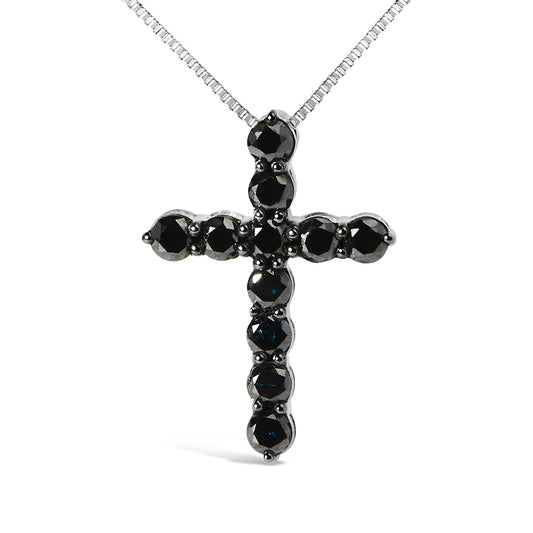 Front angle view of a white metal cross-shaped necklace pendant set with round black gemstones in prong settings.