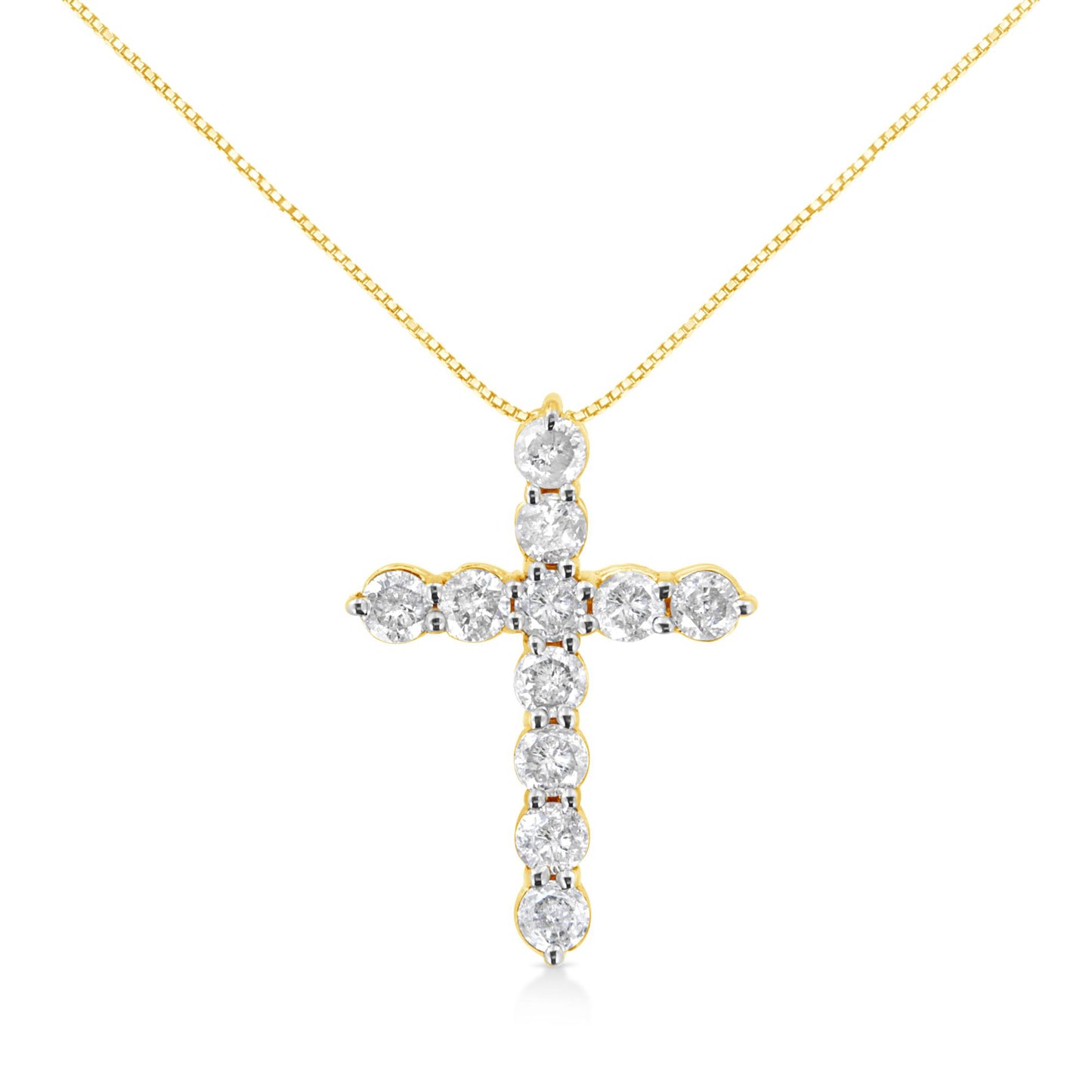 Front view of a yellow metal cross-shaped necklace pendant adorned with round white gemstones in prong settings.