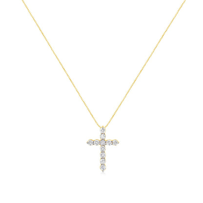 Front angle of a yellow metal necklace with a cross-shaped pendant featuring round white gemstones in prong settings.