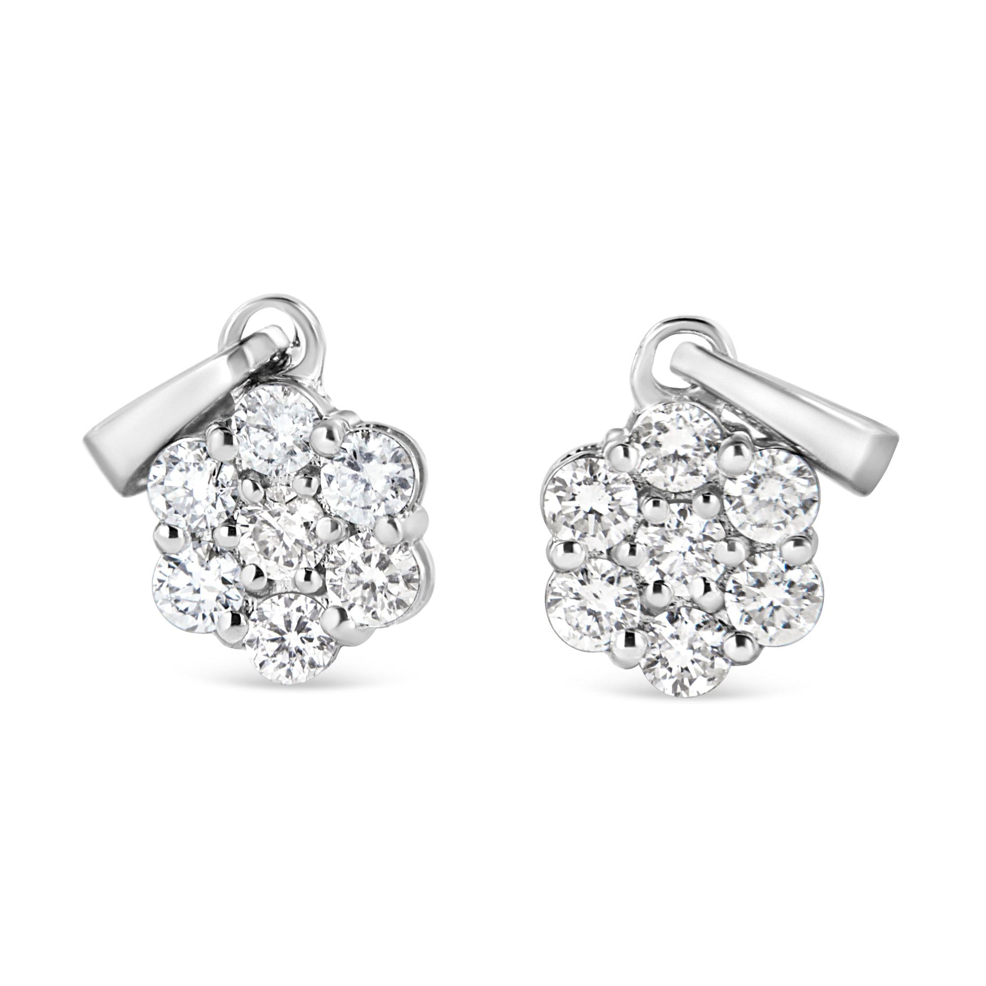 Front view of white metal necklace pendants with clusters of round white gemstones in prong settings.