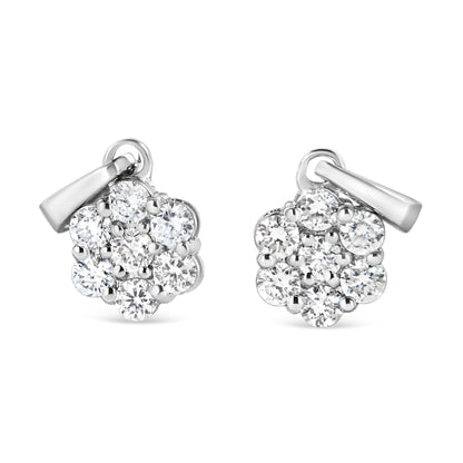 Front view of white metal necklace pendants with clusters of round white gemstones in prong settings.