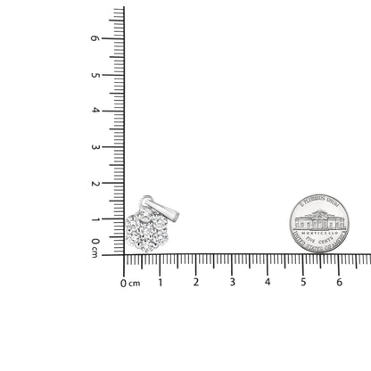 White metal necklace pendant with round prong-set white gemstones arranged in a cluster, shown on a ruler for size reference, front view.