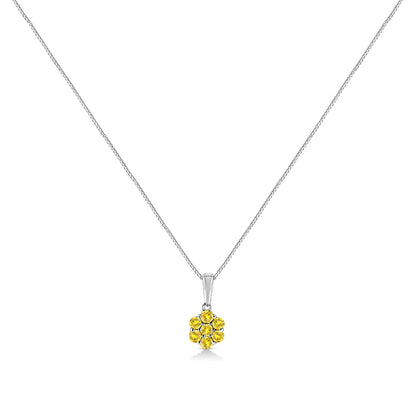 Front view of a white metal necklace with a pendant featuring round yellow gemstones in a cluster design.