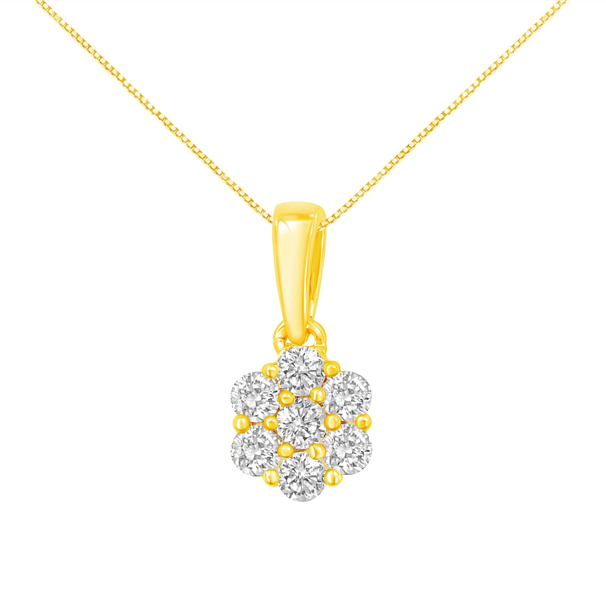 Front-facing close-up of yellow metal necklace with flower-shaped pendant featuring round white gemstones in prong settings.