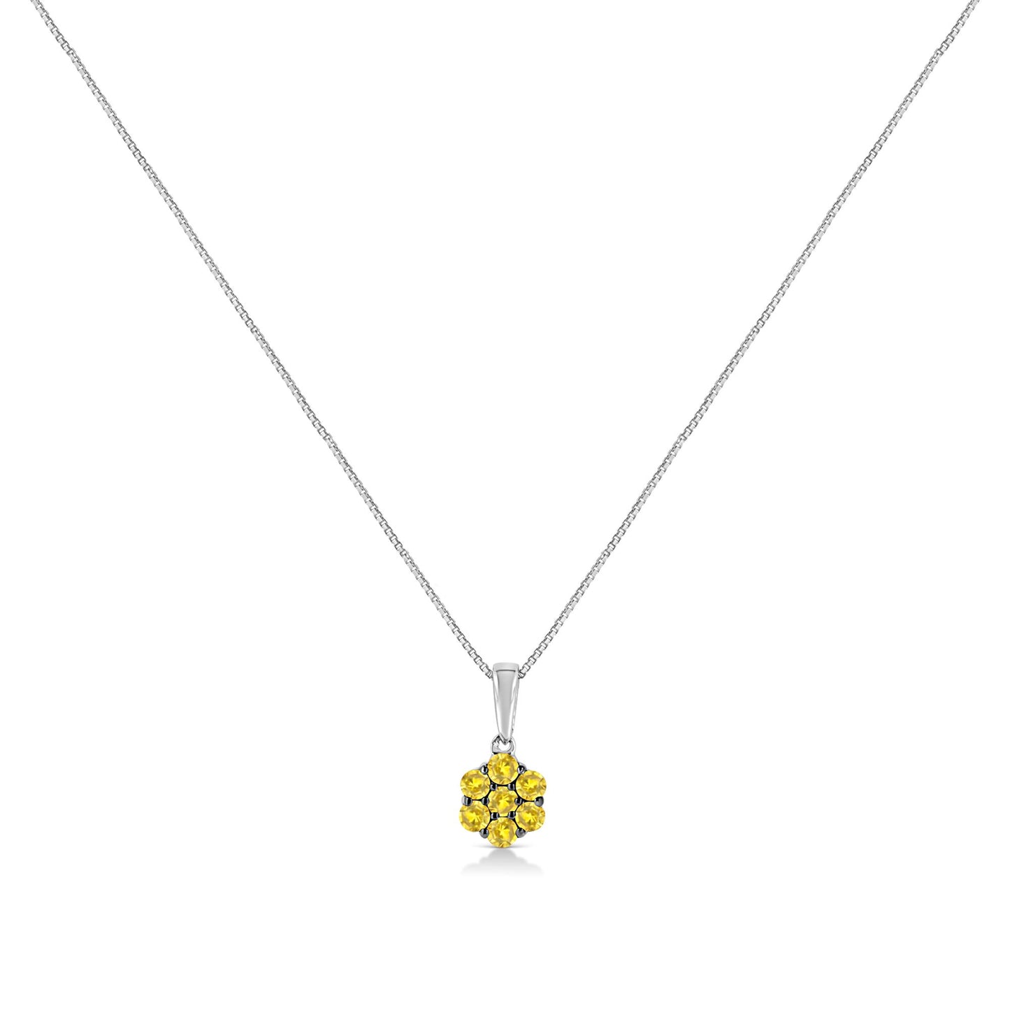 Front angle view of a white metal necklace with a pendant featuring seven round yellow gemstones in prong settings.
