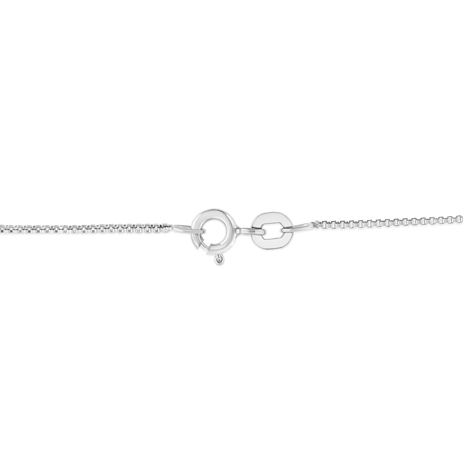 Close-up view of white metal necklace chain clasp with no visible gemstones, photographed from the top angle.
